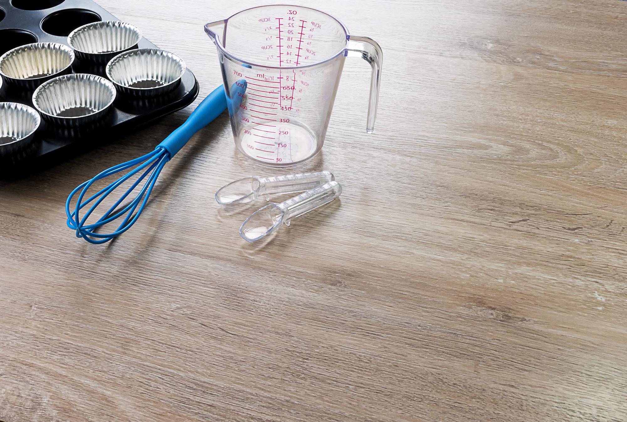 Small studio kitchen with wooden surfaces and tools