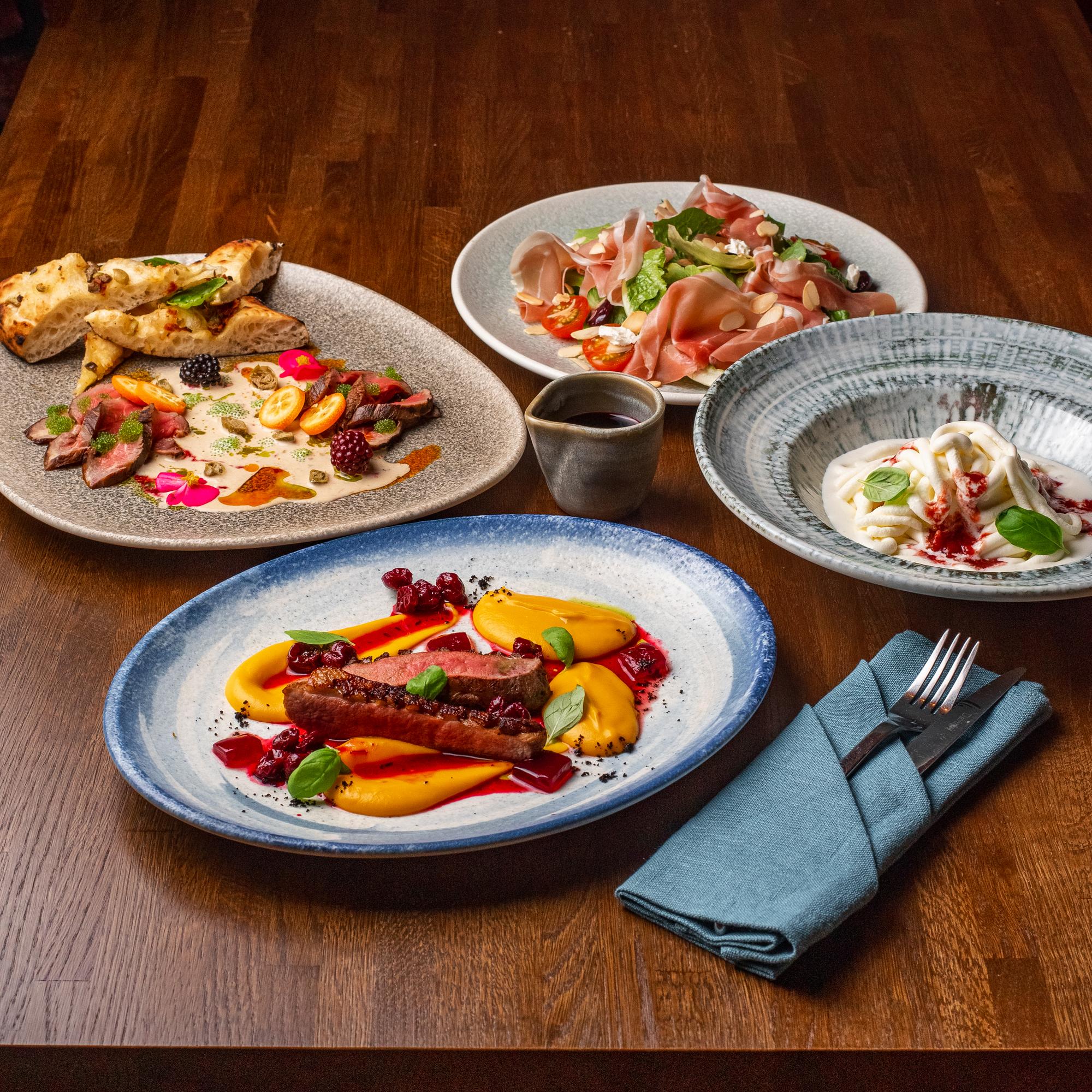 Selection of prepared dishes on table